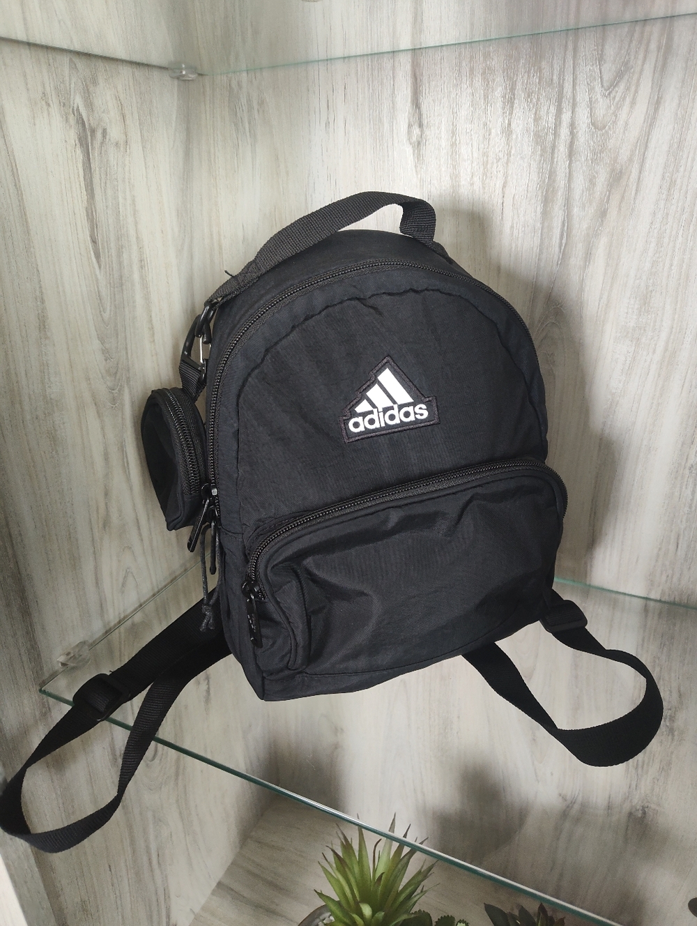 Adidas Mini Backpack with a detachable zip pouch and adjustable shoulder straps